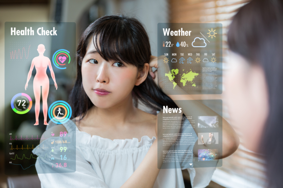 A lady looking through a smart mirror